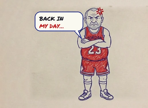 An angry older man in a red JORDAN 23 jersey, arms crossed, saying back in my day